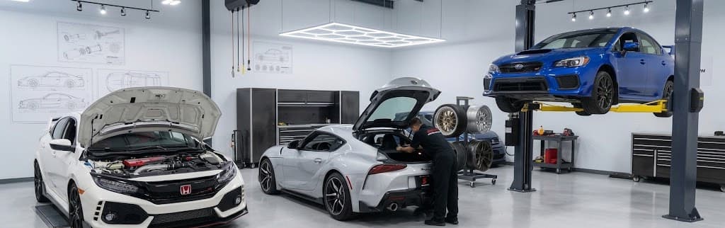 Cars being serviced in the TST Performance shop